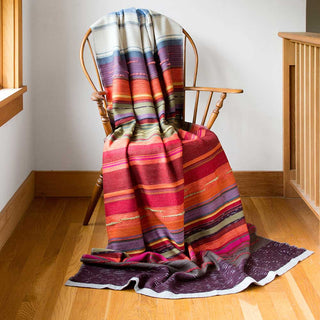 colorful throw blanket draped on chair